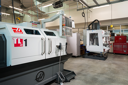 large fabrication machinery in a lab