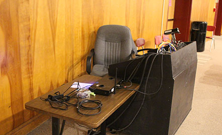 outdated sound booth in high school auditorium