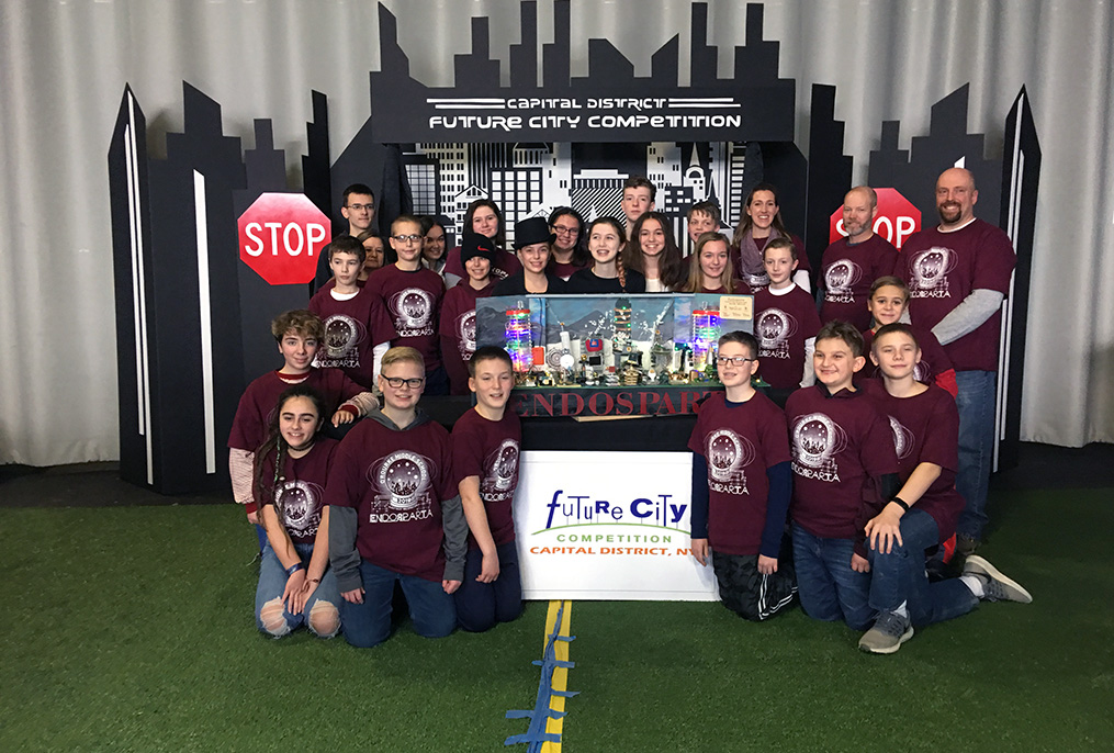 Future cities team wearing maroon shirts