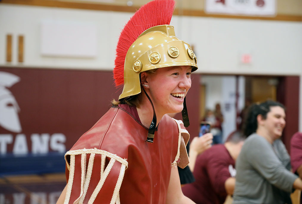 student wearing a spartan helmet