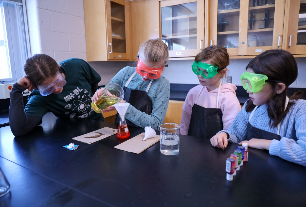 Students are working on a science experiment.