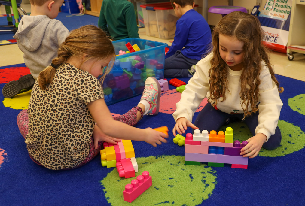 Students working with Mega Blocks in class