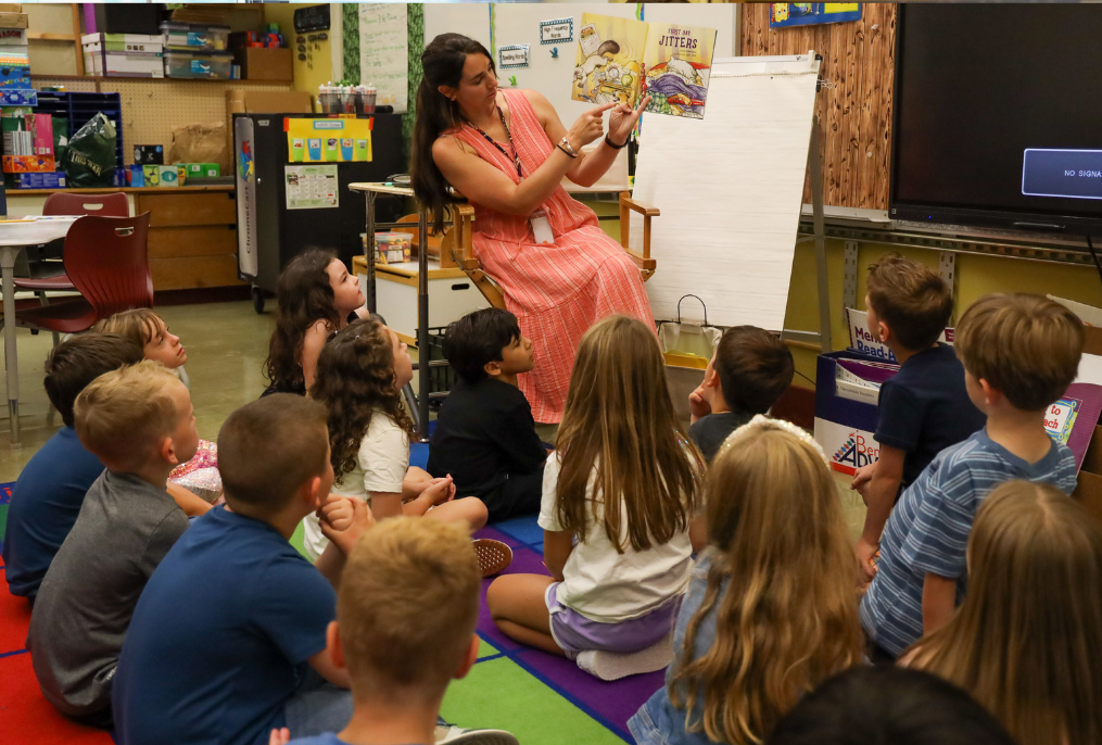 BHBL Frist Day SES A teacher reading a book to class
